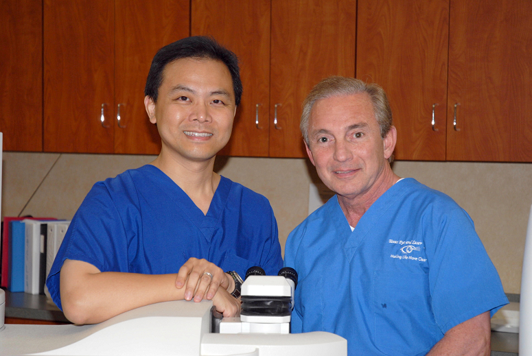 Ophthalmologists Dr. Hu and Dr. Ranelle in the LASIK suite