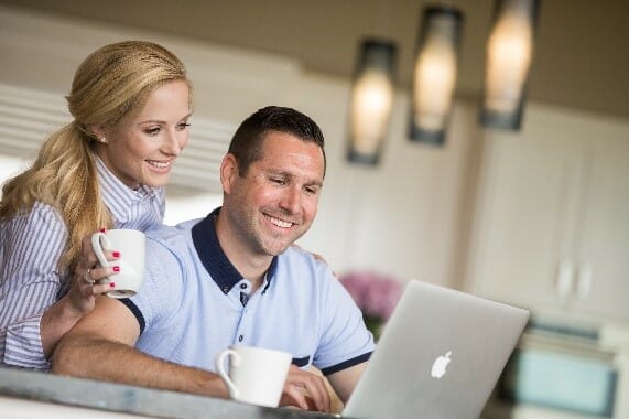 Young couple researching LASIK