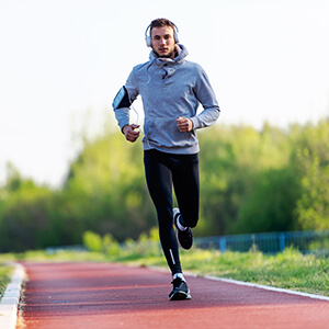 Man Running on a Track